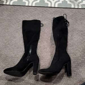 Black knee high heeled boots